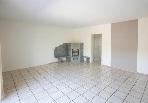 Wohnzimmer mit Specksteinofen
