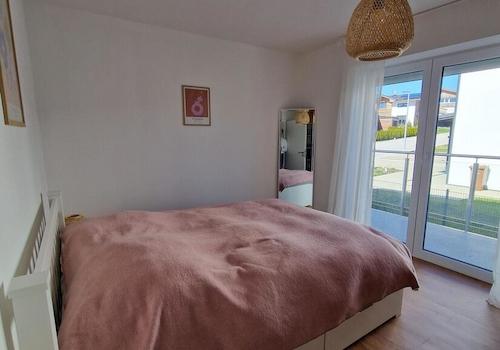 Schlafzimmer mit Balkon