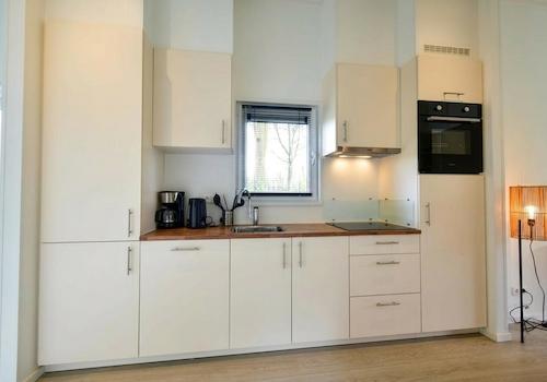 kaufen-freistehendes-ferienhaus-lith-moderne-kueche-einbaugeraete-recreatieadviseurs-vakantiehuistekoop-nl.jpg