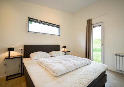 kaufen-freistehendes-ferienhaus-lith-schlafzimmer-gartenzugang-recreatieadviseurs-vakantiehuistekoop-nl.jpg