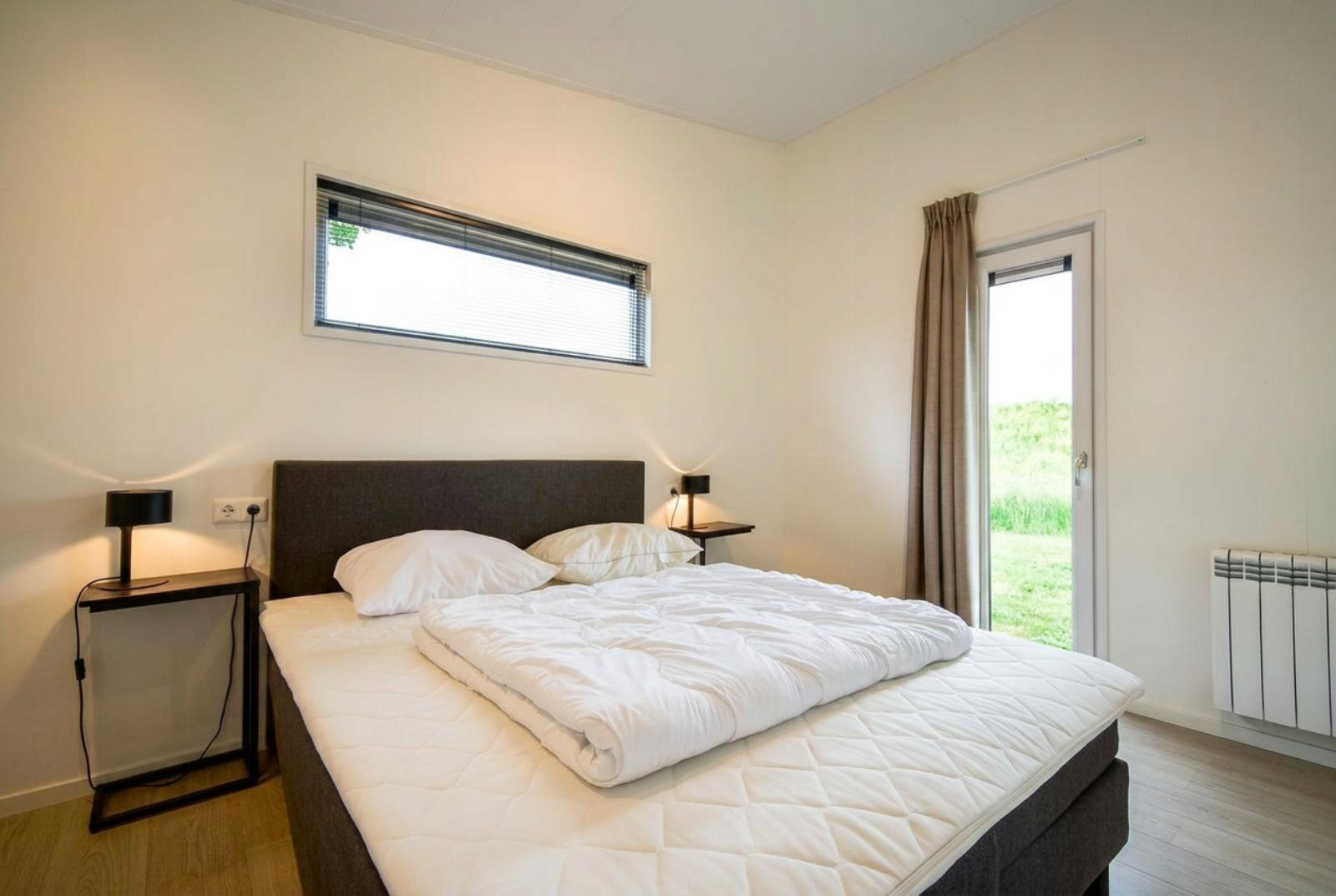 kaufen-freistehendes-ferienhaus-lith-schlafzimmer-gartenzugang-recreatieadviseurs-vakantiehuistekoop-nl.jpg