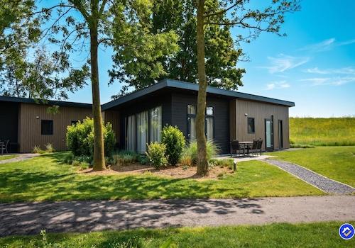 kaufen-freistehendes-ferienhaus-lith-aussenansicht-sonniger-garten-recreatieadviseurs-vakantiehuistekoop-nl.jpg