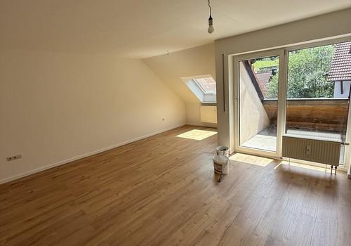 Wohnzimmer mit Balkon