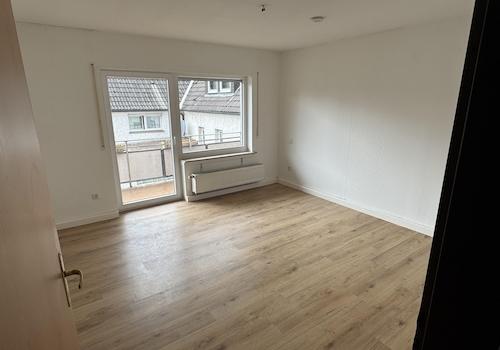 Zimmer mit Balkonzugang