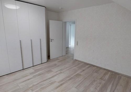 Schlafzimmer mit Einbauschrank