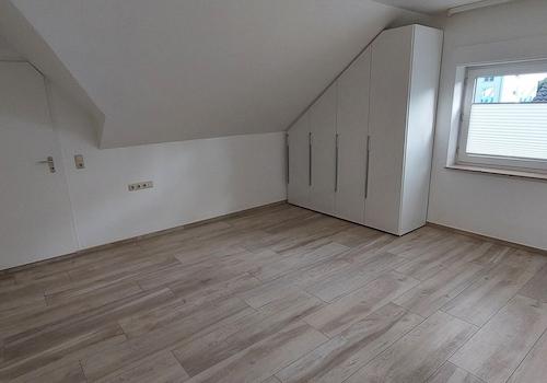 Schlafzimmer mit Einbauschrank