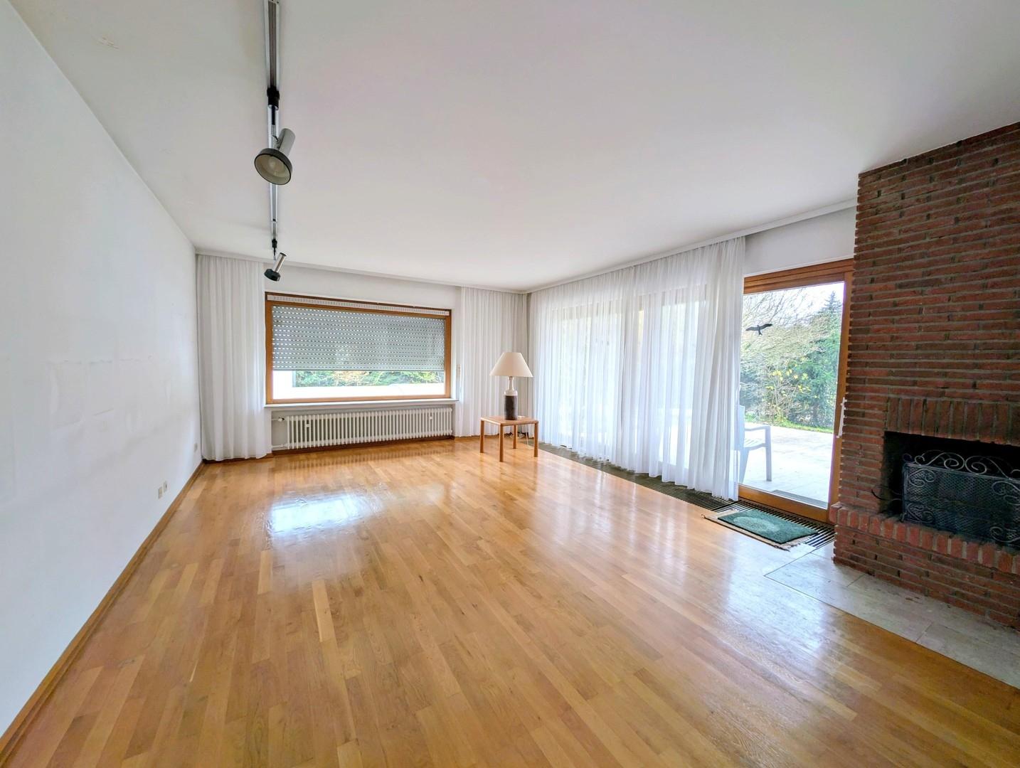 Wohnzimmer mit Kamin 40 m²
