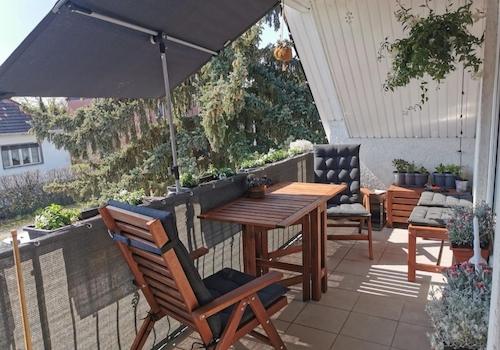 Überdachter Balkon