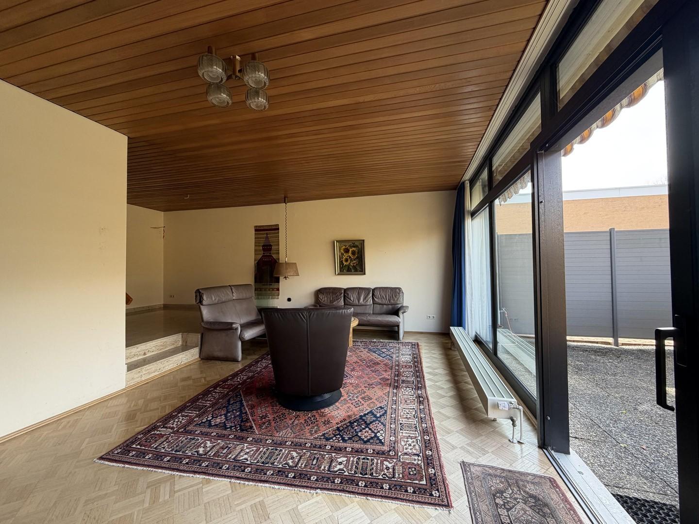 Wohnzimmer mit Esszimmer