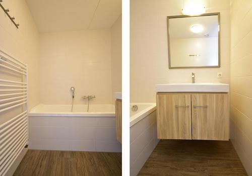 kaufen-freistehendes-ferienhaus-ouddorp-badezimmer-badewanne-waschtisch-recreatieadviseurs-vakantiehuistekoop-nl.jpg