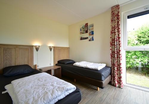 kaufen-freistehendes-ferienhaus-ouddorp-zweites-schlafzimmer-einzelbetten-recreatieadviseurs-vakantiehuistekoop-nl.jpg