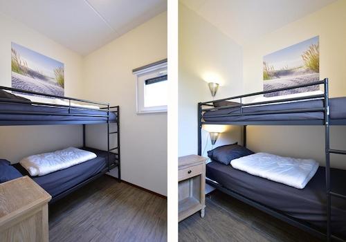 kaufen-freistehendes-ferienhaus-ouddorp-drittes-schlafzimmer-etagenbett-fenster-recreatieadviseurs-vakantiehuistekoop-nl.jpg