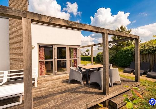 kaufen-freistehende-stein-ferienvilla-ouddorp-aussenbereich-terrasse-veranda-recreatieadviseurs-vakantiehuistekoop-nl.jpg