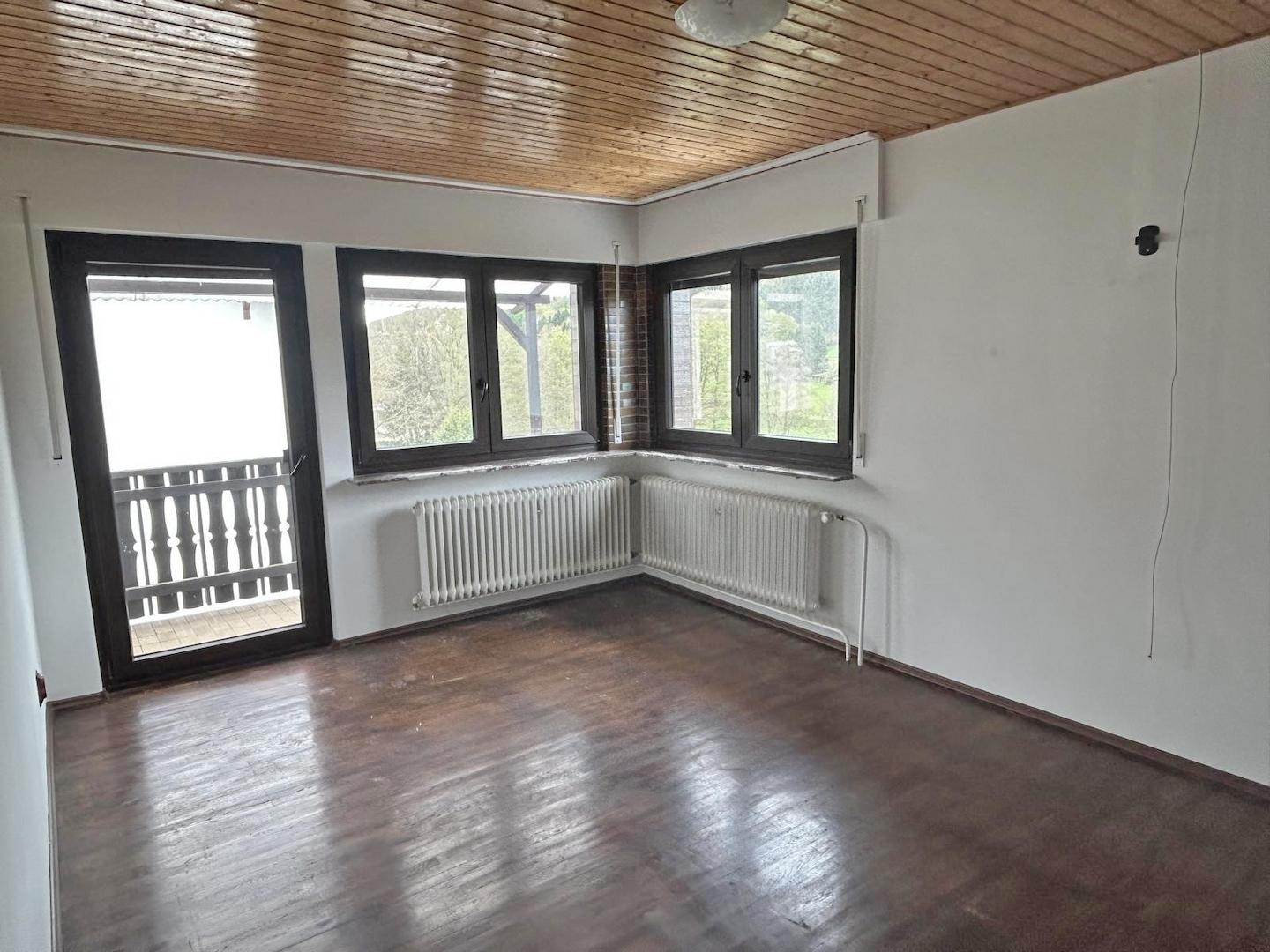 OG Wohn- und Esszimmer mit Balkon