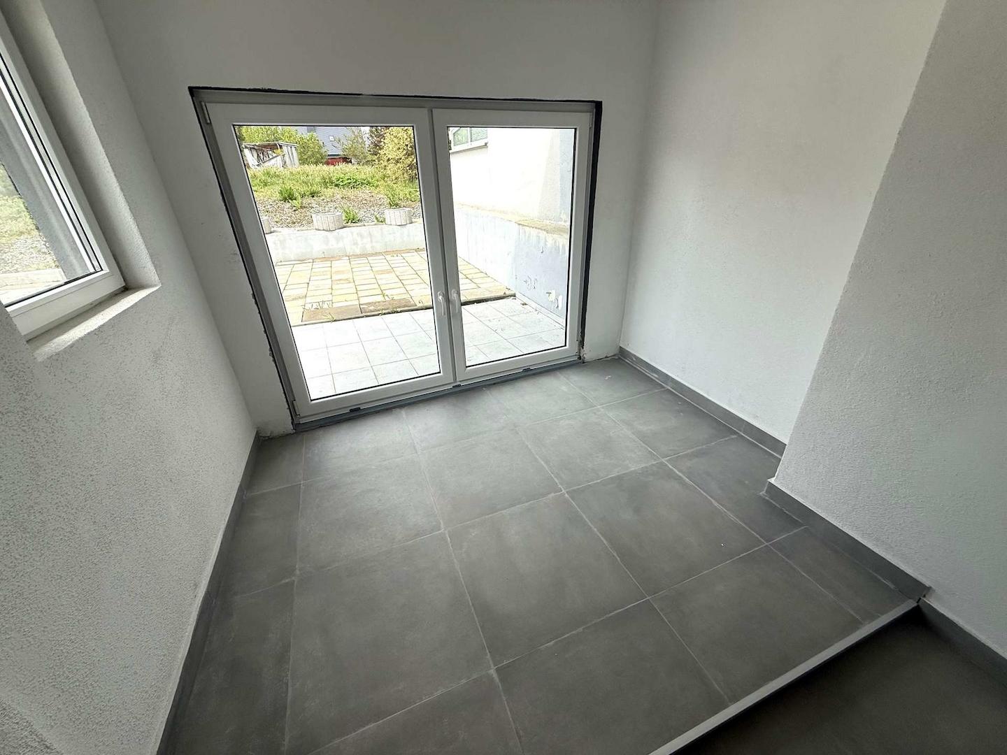 Wohnzimmer mit Terrasse