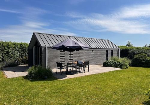 kaufen-freistehendes-ferienhaus-olburgen-aussenansicht-sonnenterrasse-recreatieadviseurs-vakantiehuistekoop-nl.jpg