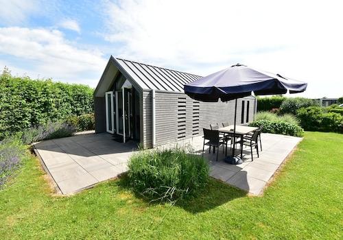 kaufen-freistehendes-ferienhaus-olburgen-aussenansicht-sonnenterrasse-recreatieadviseur-vakantiehuistekoop-nl.jpg