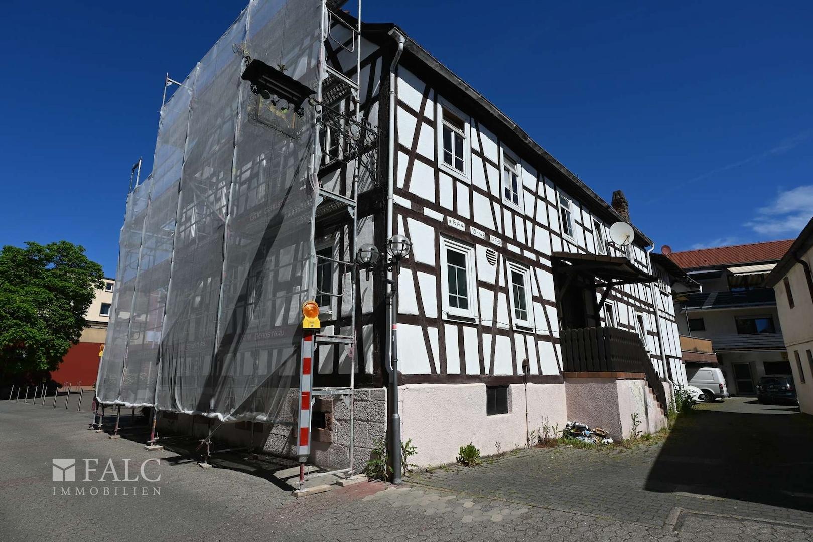 Wohn- + Geschäftshaus