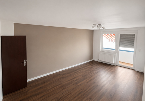 Wohnzimmer mit Westbalkon