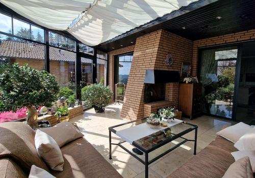 Wintergarten mit Kamin