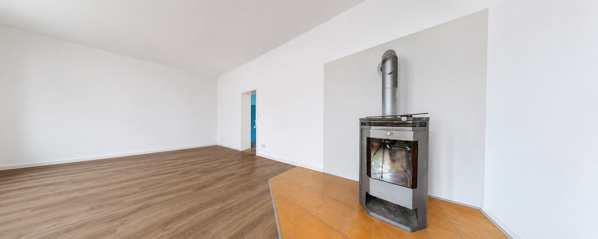 Wohnzimmer mit Kamin