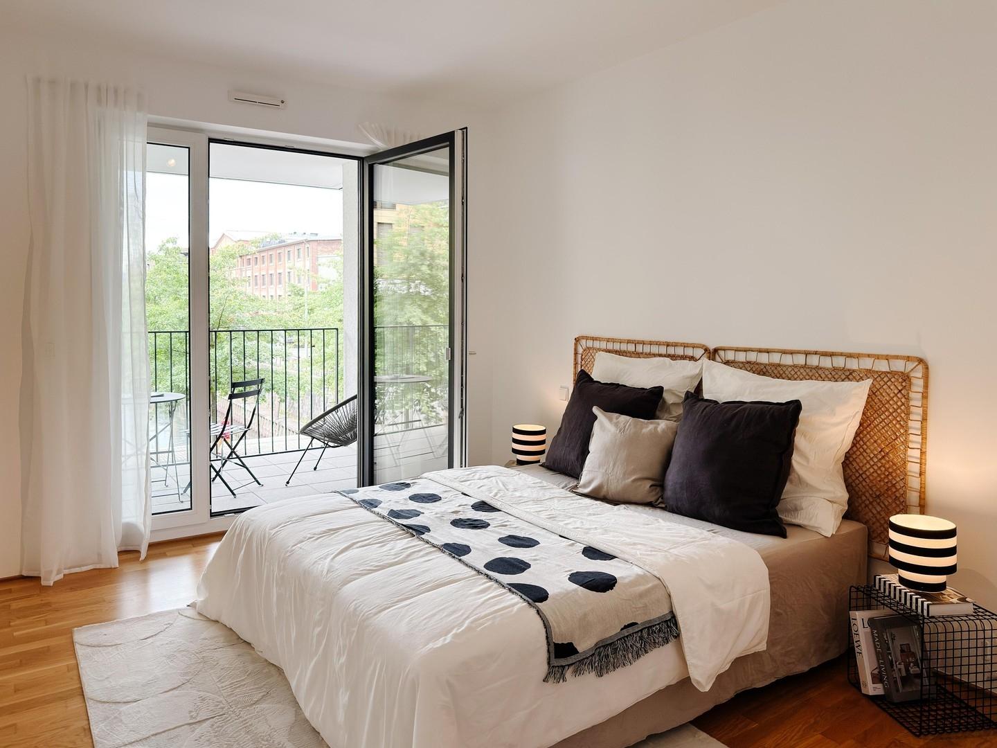 Schlafzimmer mit Balkonzugang