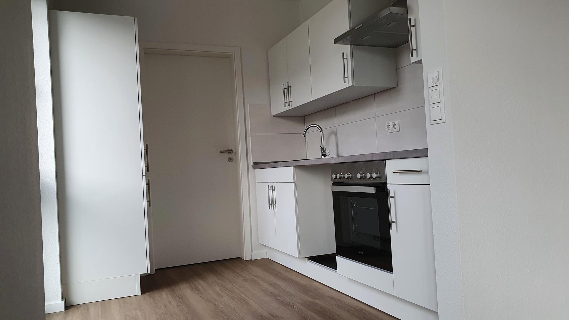 Wohnzimmer mit Küche