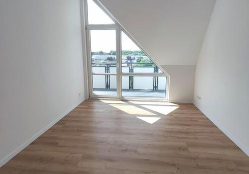 Schlafzimmer mit Balkonzugang