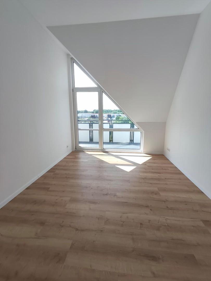 Schlafzimmer mit Balkonzugang