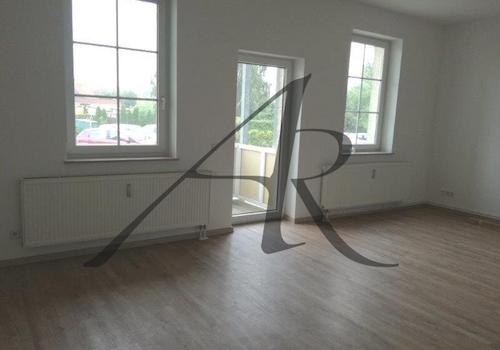 Wohnzimmer mit Balkon