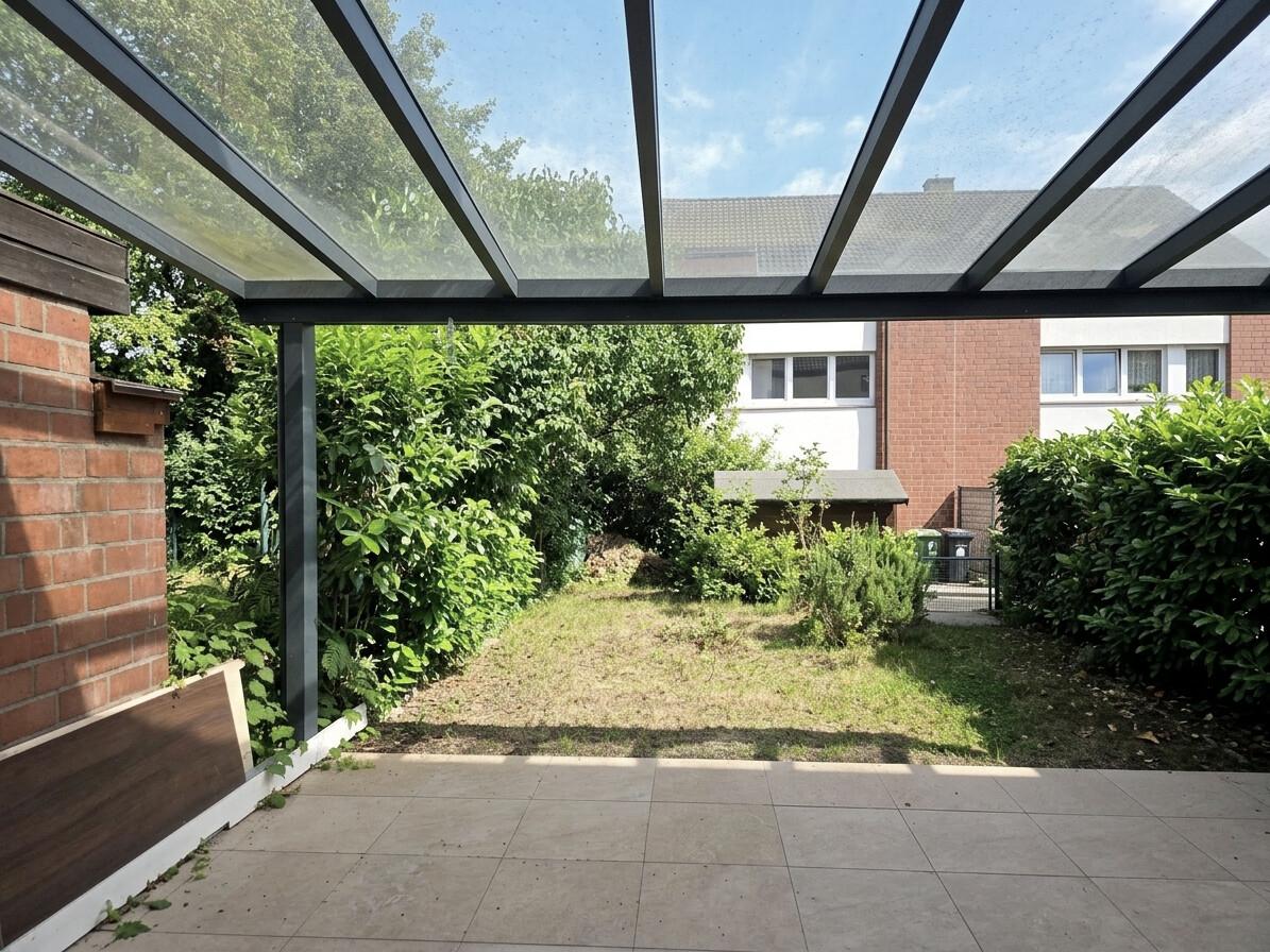 Überdachte Terrasse u. Garten
