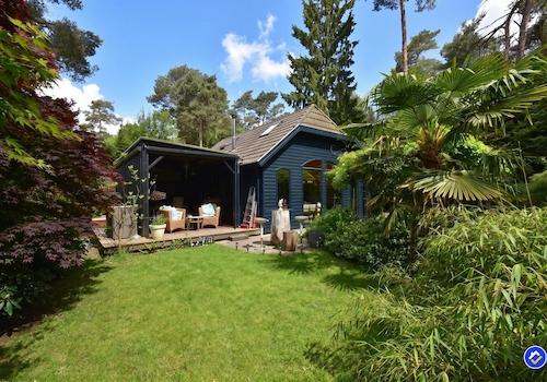 kaufen-freistehendes-ferienhaus-doornspijk-garten-ueberdachte-veranda-recreatieadviseurs-vakantiehuistekoop-nl.jpg
