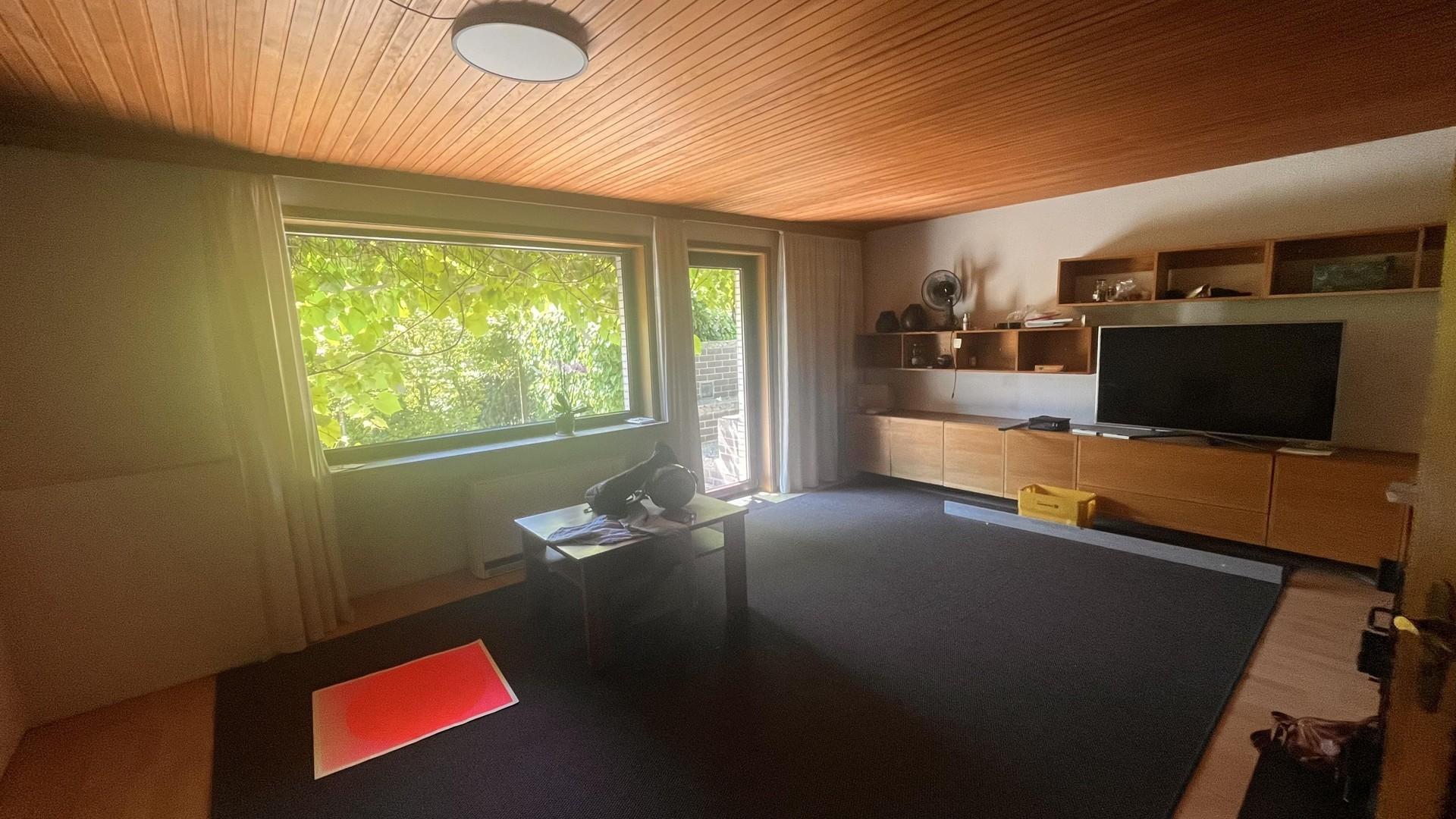 Wohnzimmer/Ausgang Garten