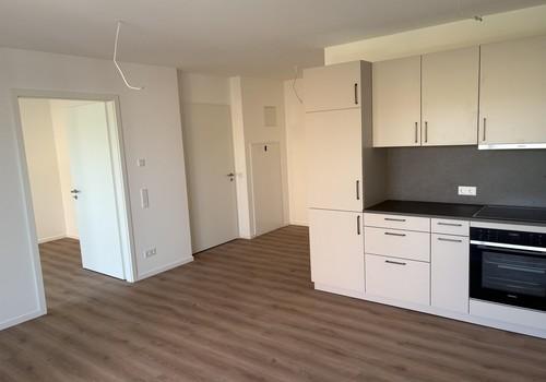 Wohnzimmer mit Küche