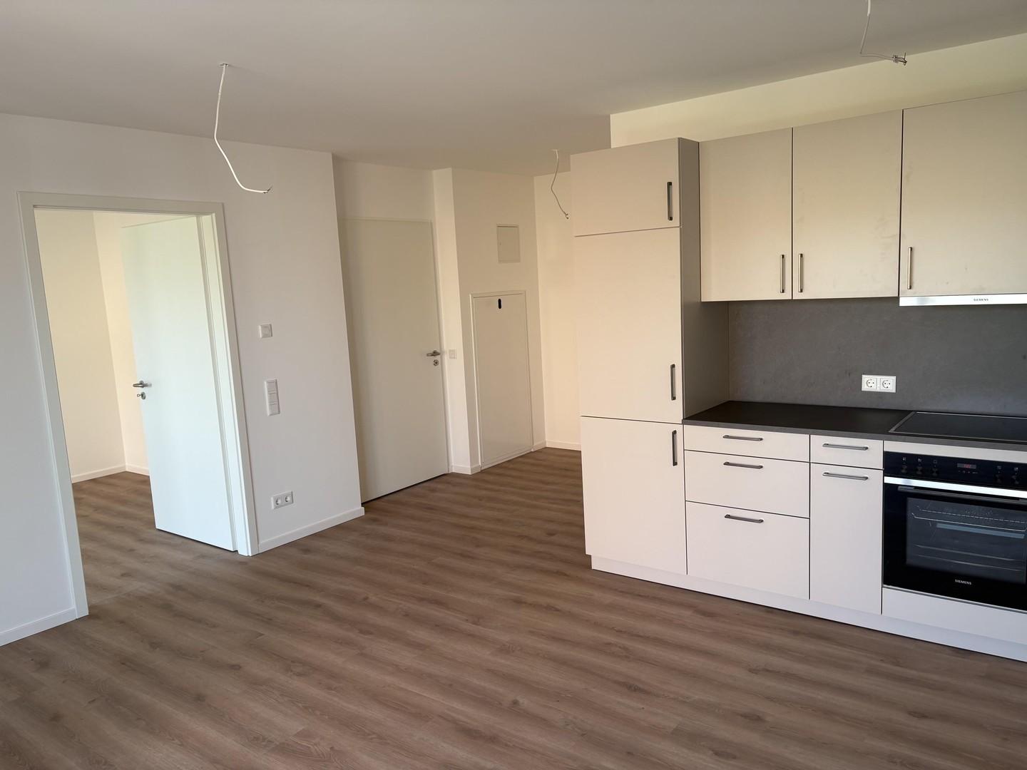 Wohnzimmer mit Küche