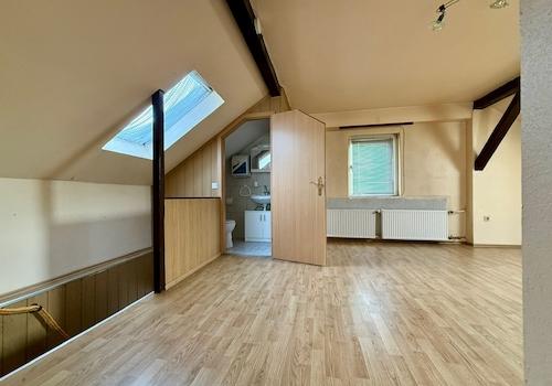 Dachgeschoss: Flexibler Durchgangsraum + WC
