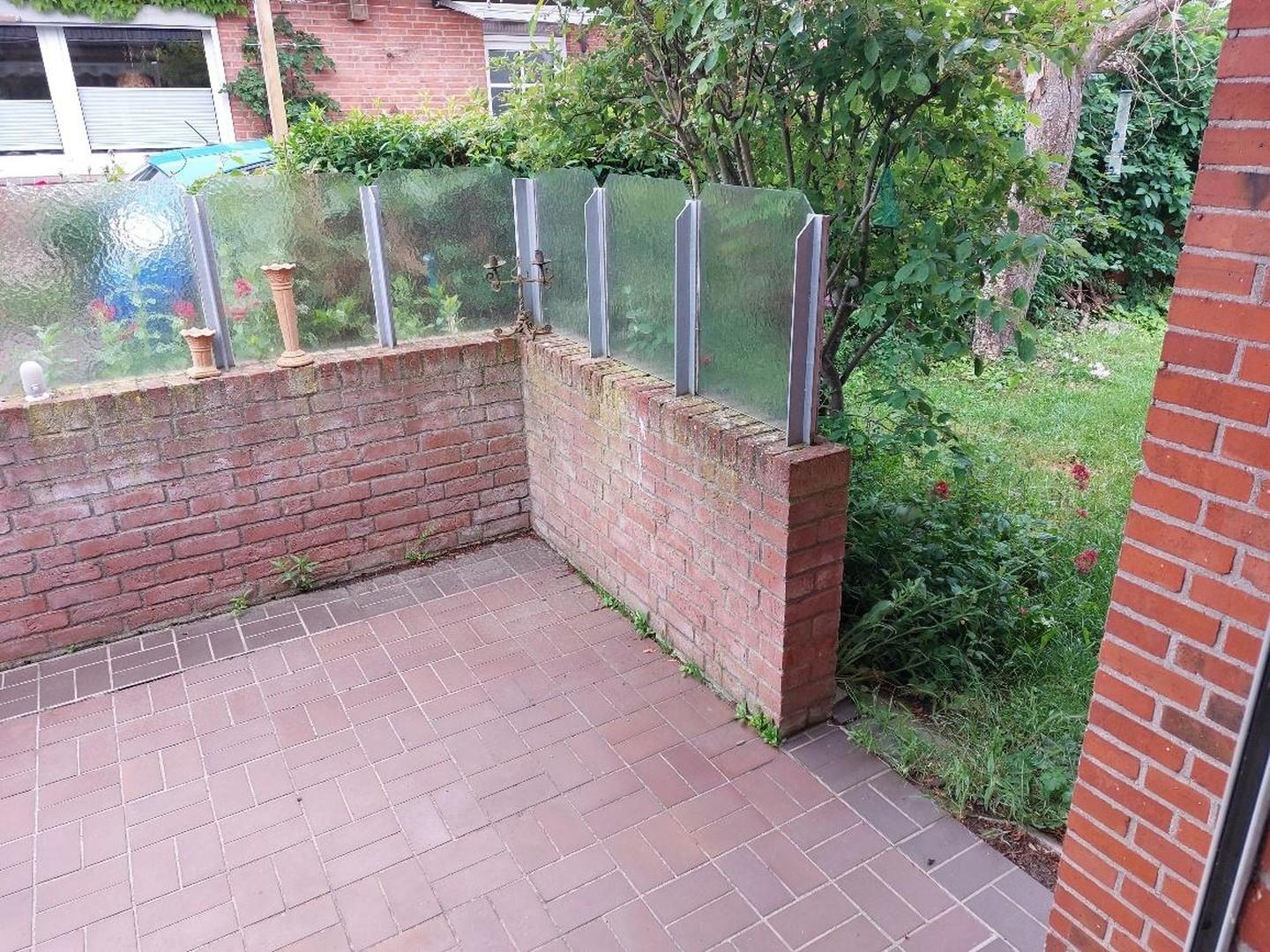 Terrasse mit Zugang zum Garten