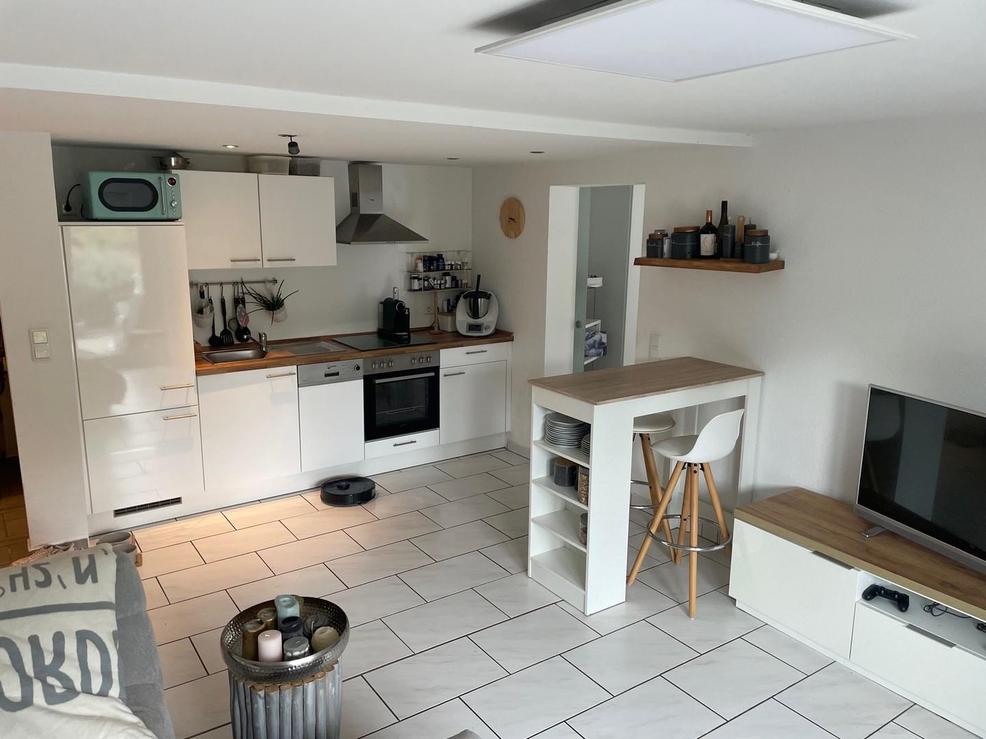 Wohnzimmer mit Küche