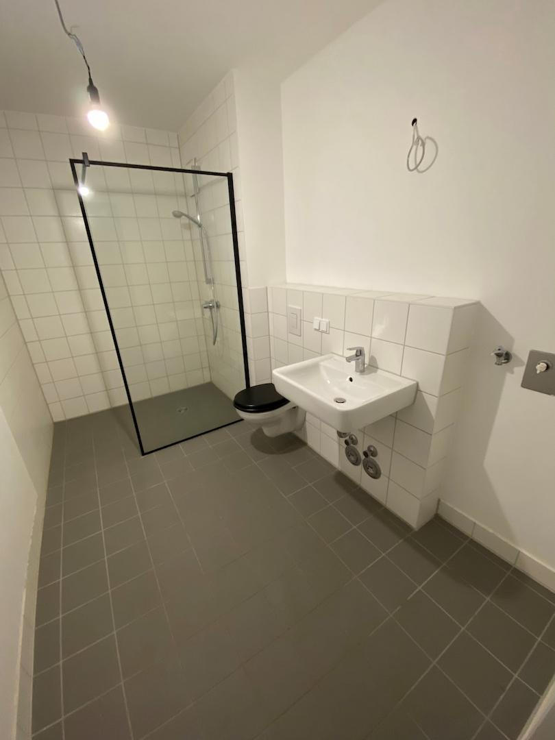 Bad mit bodengleicher Dusche