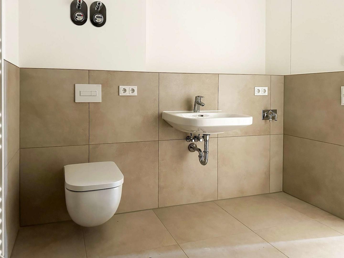 Badezimmer mit Waschmaschinenanschluss