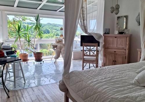 Schlafzimmer mit Wintergarten