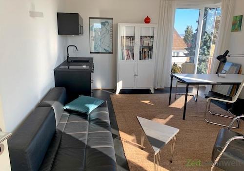 Wohnzimmer mit Küchenblock