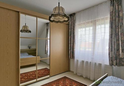 verspiegelter Kleiderschrank