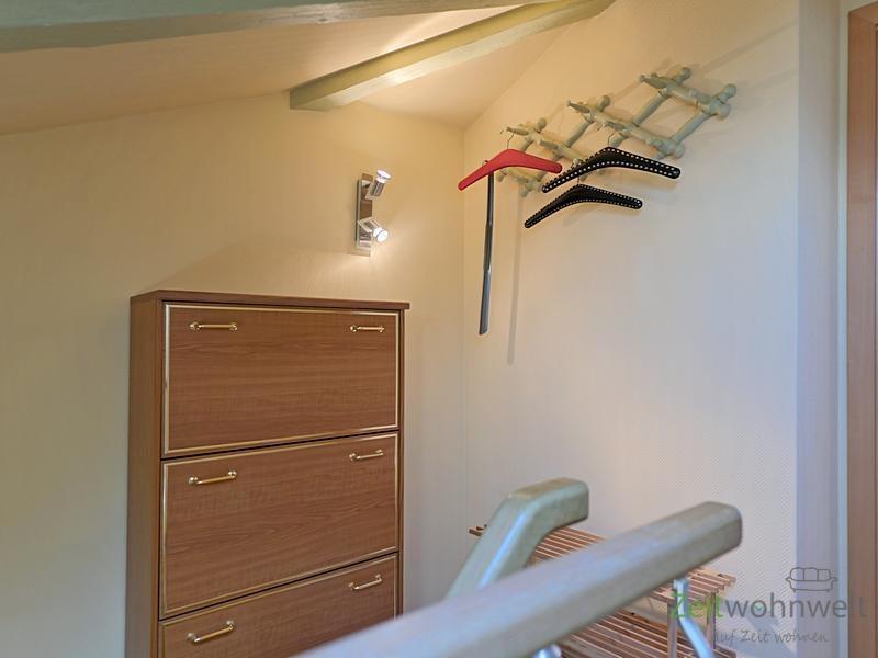 Treppenaufgang mit Garderobe