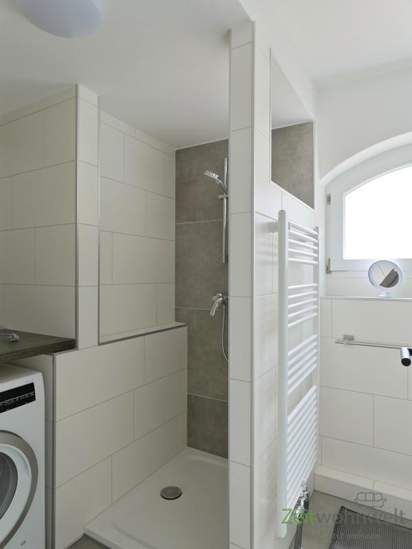 Dusche und Waschmaschine