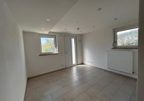 Raum im UG mit Nebeneingang