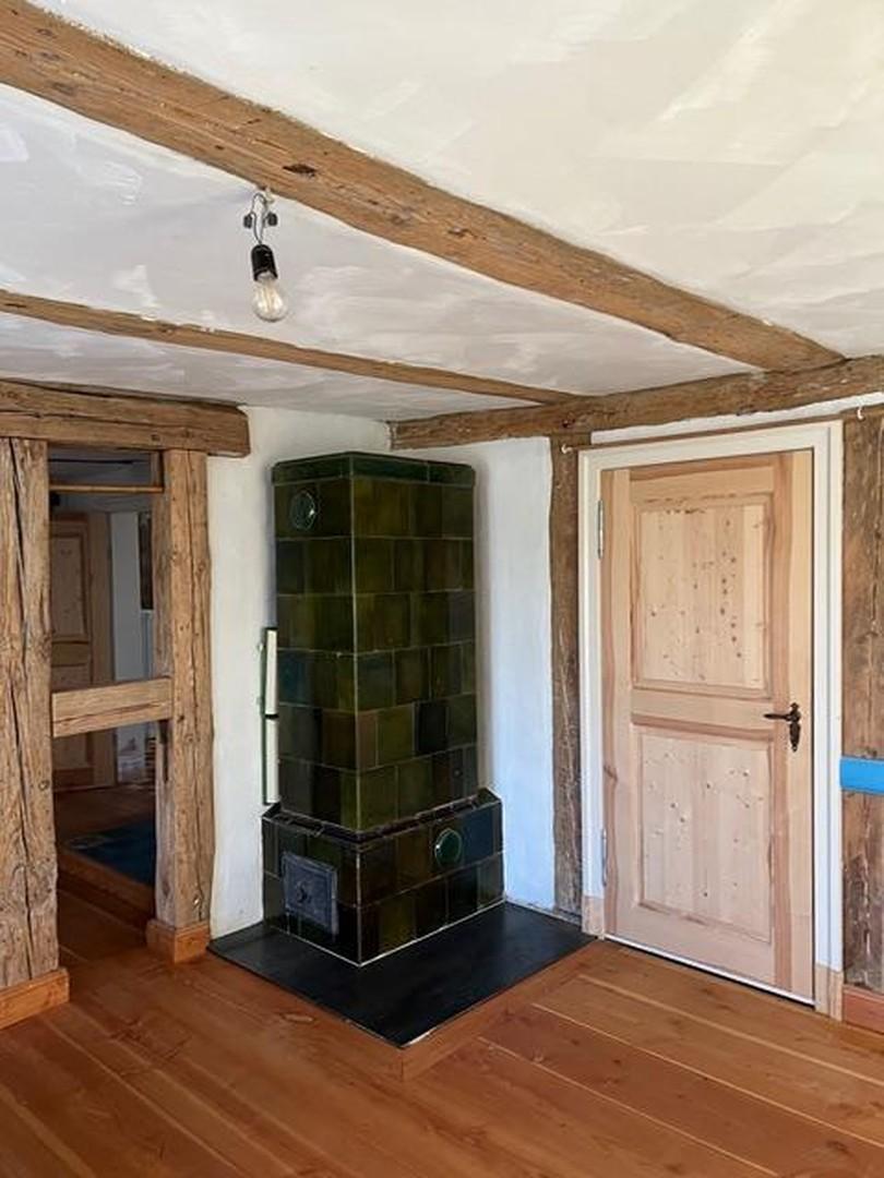 Südwestzimmer mit Holzofen