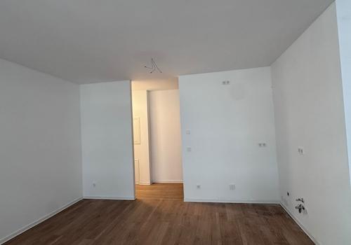 Zimmer mit offener Wohnküche