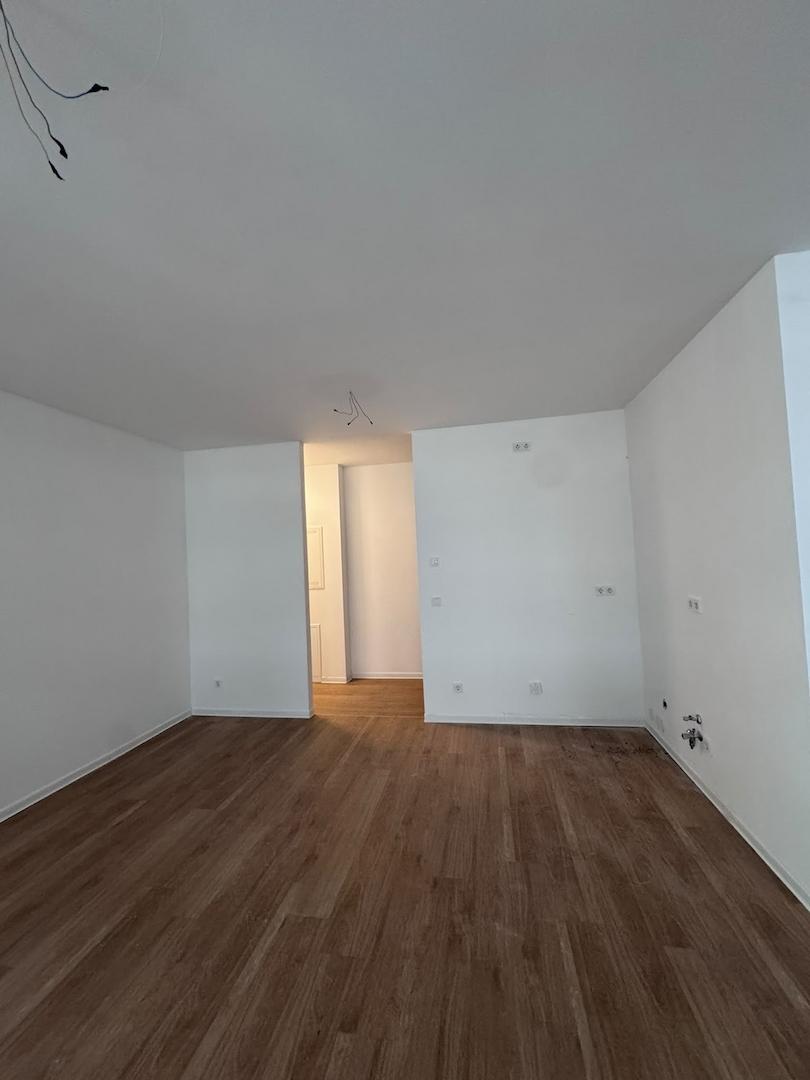Zimmer mit offener Wohnküche