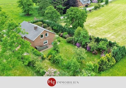 H&T Immobilien - Bungalow in Twistringen